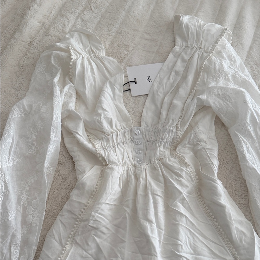 Elegant White YLLW The Label Long Sleeve Romper